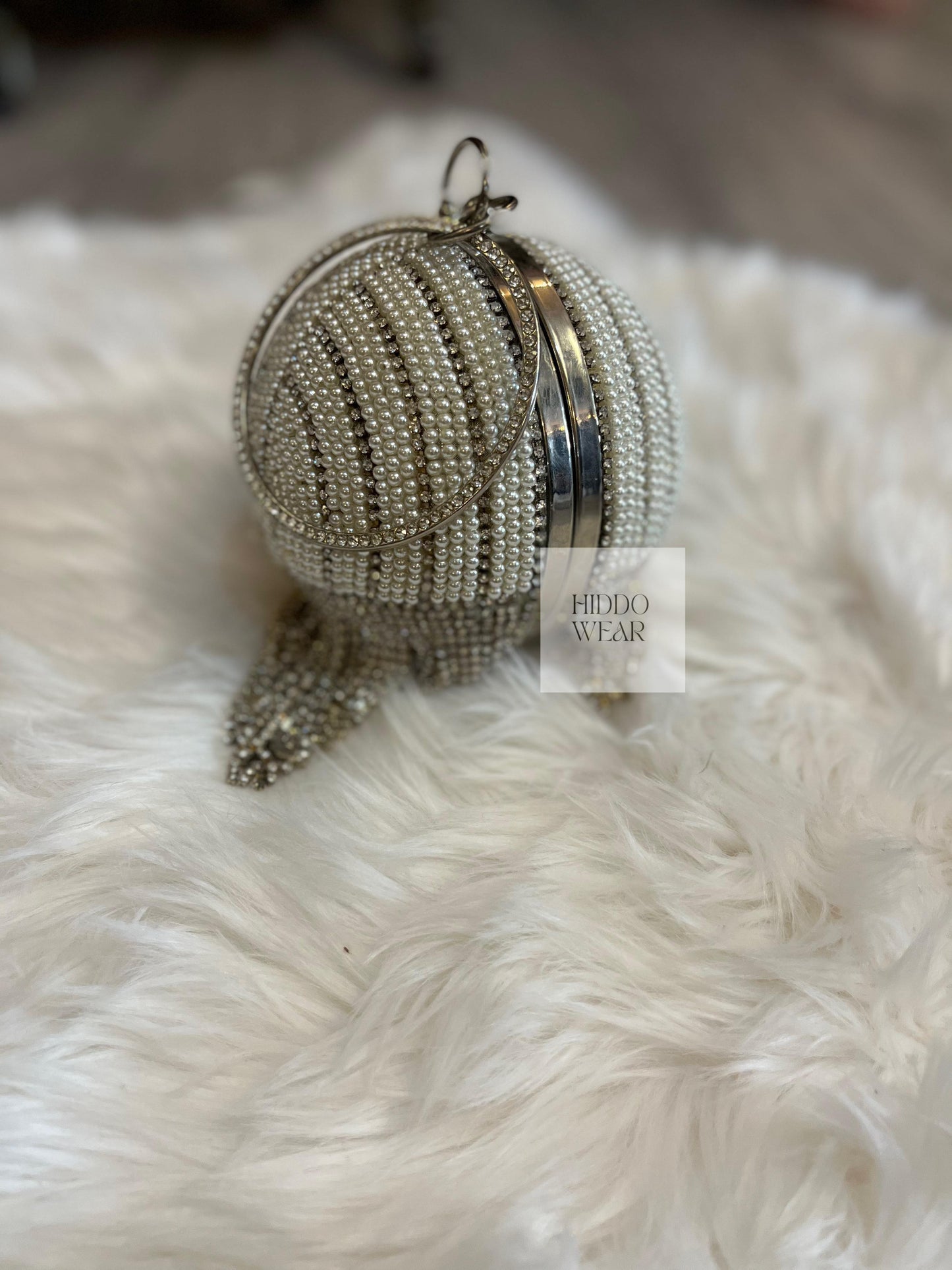 Silver, round ball handbag